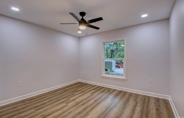 1114 Edgehill Dr, Benton, AR 72015 - empty room with wood finished floors, baseboards, recessed lighting, and ceiling fan