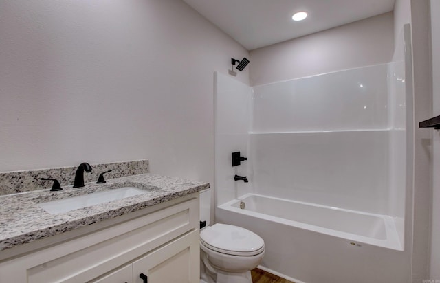 1114 Edgehill Dr, Benton, AR 72015 - bathroom featuring toilet, vanity, tub / shower combination, and wood finished floors