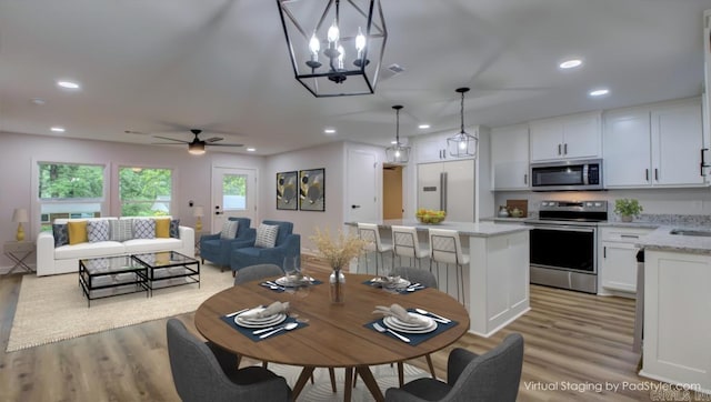 1114 Edgehill Dr, Benton, AR 72015 - dining area featuring light wood-type flooring, recessed lighting, and a ceiling fan