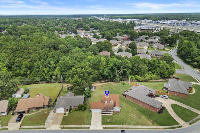 aerial view of property's location with nearby suburban area