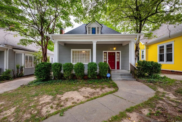 111 Thayer St, Little Rock, AR 72205 - view of front of property with a porch, a chimney, and a shingled roof