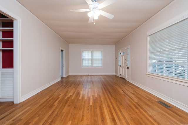 111 Thayer St, Little Rock, AR 72205 - unfurnished room with light wood finished floors, baseboards, a ceiling fan, and ornamental molding