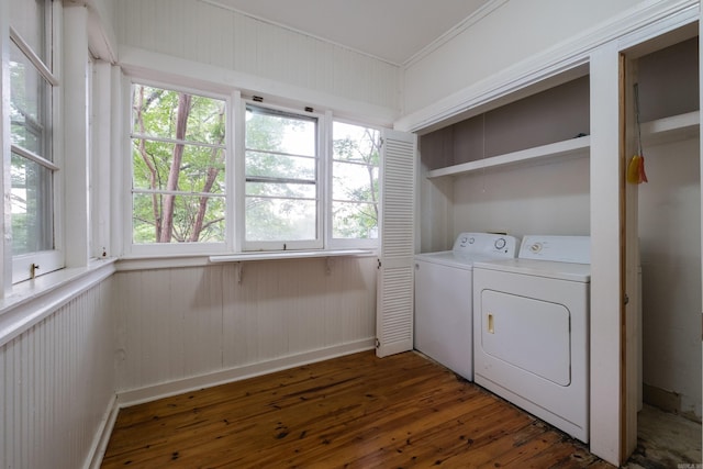 111 Thayer St, Little Rock, AR 72205 - laundry area with washer and dryer, dark wood-style flooring, and ornamental molding