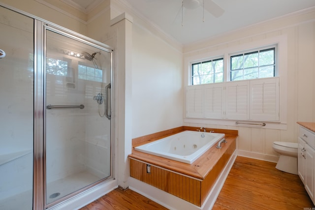 111 Thayer St, Little Rock, AR 72205 - full bathroom featuring crown molding, a stall shower, a whirlpool tub, wood finished floors, and a ceiling fan
