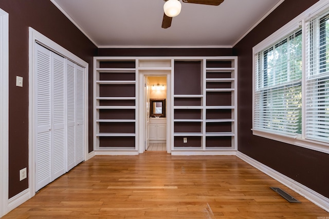 111 Thayer St, Little Rock, AR 72205 - unfurnished dining area featuring ornamental molding, a ceiling fan, light wood finished floors, and baseboards