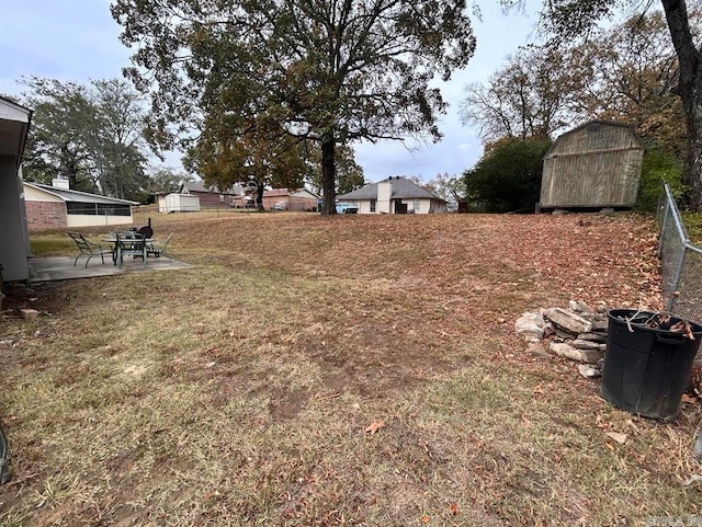 9314 Timber Valley Rd, Little Rock, AR 72204 - view of yard with a patio area and an outdoor structure