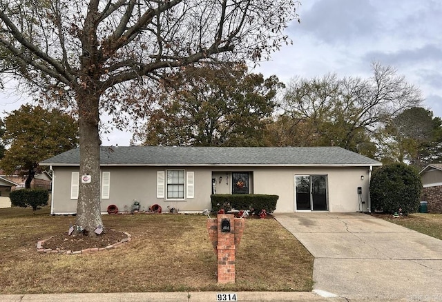 9314 Timber Valley Rd, Little Rock, AR 72204 - ranch-style home with concrete driveway, stucco siding, and a front yard