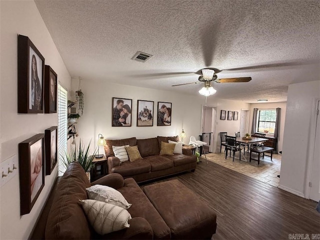 809 Walnut St, Dardanelle, AR 72834 - living room with a ceiling fan and a textured ceiling