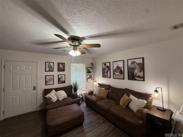 809 Walnut St, Dardanelle, AR 72834 - living room with ceiling fan, a textured ceiling, and wood finished floors