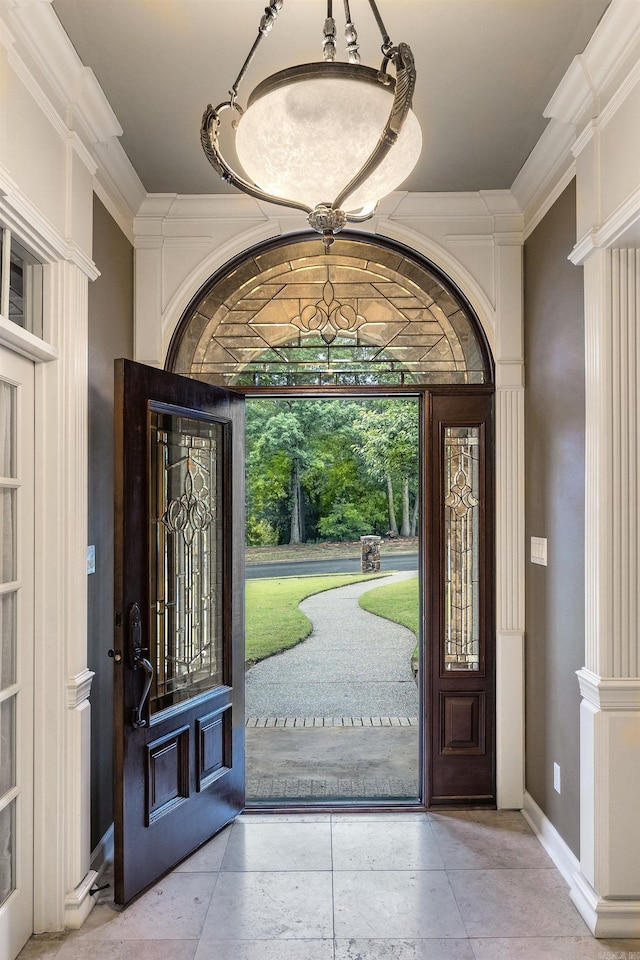 126 Manitou Dr, Maumelle, AR 72113 - tiled entryway with ornamental molding and baseboards