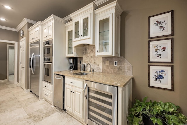 126 Manitou Dr, Maumelle, AR 72113 - kitchen featuring beverage cooler, a sink, backsplash, appliances with stainless steel finishes, and light stone counters