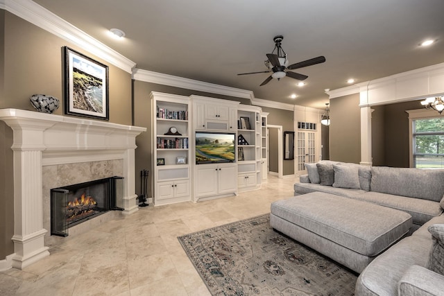 126 Manitou Dr, Maumelle, AR 72113 - living area with a ceiling fan, ornamental molding, a high end fireplace, and recessed lighting