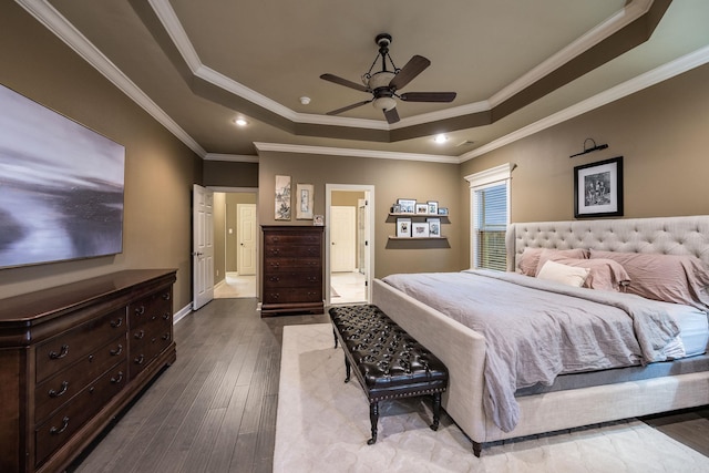 126 Manitou Dr, Maumelle, AR 72113 - bedroom with a raised ceiling, hardwood / wood-style floors, ornamental molding, baseboards, and a ceiling fan