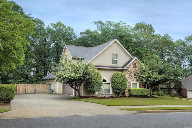 126 Manitou Dr, Maumelle, AR 72113 - view of front of house featuring concrete driveway and stone siding