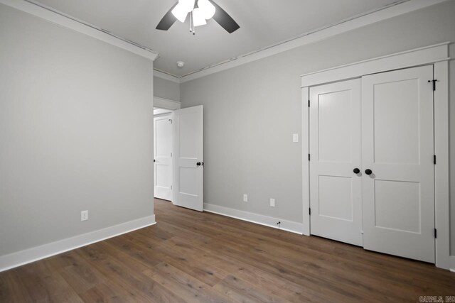 9313 Wooddale Dr, Sherwood, AR 72120 - unfurnished bedroom with ornamental molding, baseboards, wood finished floors, a ceiling fan, and a closet
