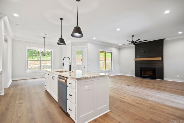 9313 Wooddale Dr, Sherwood, AR 72120 - kitchen with dishwasher, a ceiling fan, a sink, ornamental molding, and white cabinetry