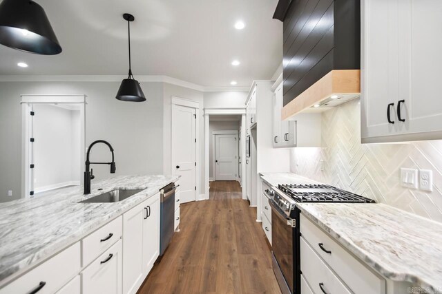 9313 Wooddale Dr, Sherwood, AR 72120 - kitchen featuring stainless steel appliances, a sink, custom exhaust hood, crown molding, and recessed lighting