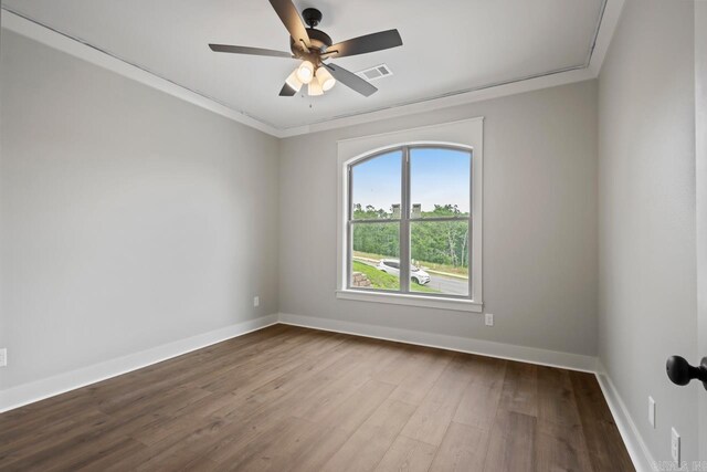 9313 Wooddale Dr, Sherwood, AR 72120 - unfurnished room with wood finished floors, baseboards, ceiling fan, and ornamental molding