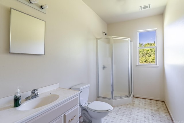 224 Peartree, Jacksonville, AR 72076 - bathroom with a shower stall, tile patterned floors, vanity, and toilet