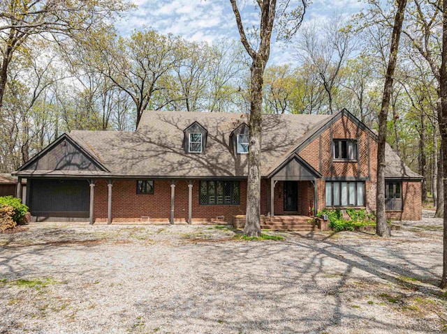 2005 Kingshighway, Weiner, AR 72479 - view of front of home with brick siding, a shingled roof, and covered porch