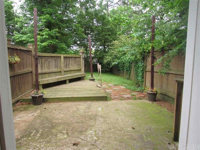 821 Mcadoo St, Little Rock, AR 72205 - fenced backyard featuring a patio area and a deck