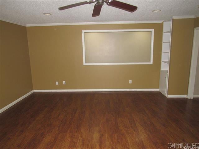 821 Mcadoo St, Little Rock, AR 72205 - empty room featuring ceiling fan, wood finished floors, a textured ceiling, baseboards, and crown molding