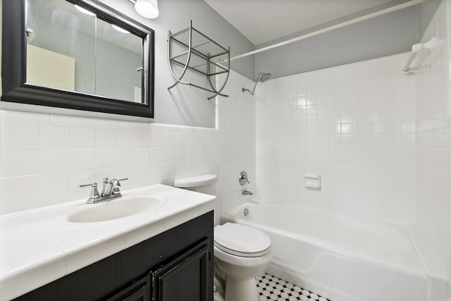 821 Mcadoo St, Little Rock, AR 72205 - full bath with shower / tub combination, toilet, vanity, and tile walls