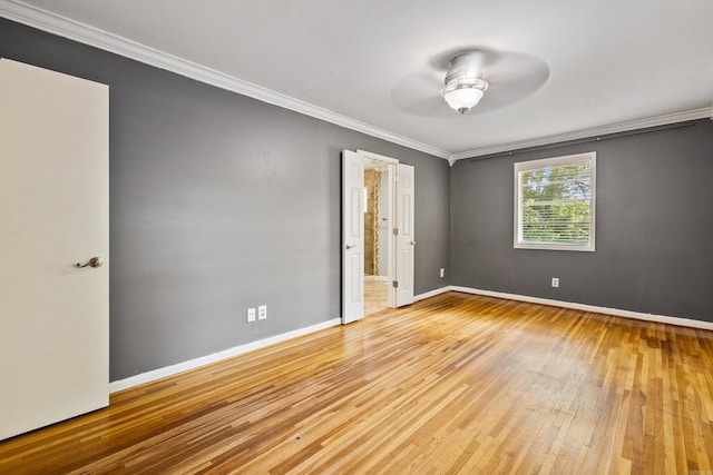 821 Mcadoo St, Little Rock, AR 72205 - empty room featuring crown molding, hardwood / wood-style floors, ceiling fan, and baseboards
