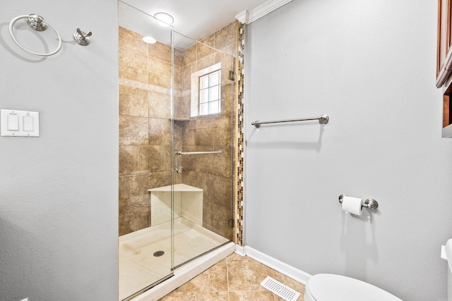 821 Mcadoo St, Little Rock, AR 72205 - full bathroom with a stall shower, toilet, baseboards, and tile patterned flooring