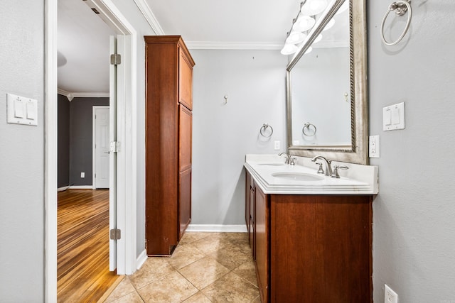 821 Mcadoo St, Little Rock, AR 72205 - full bath with crown molding, double vanity, and baseboards