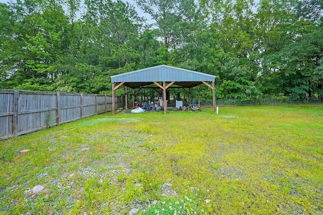 view of yard with a detached carport