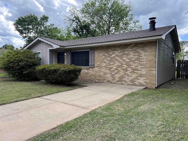 1302 Collins Dr, Pine Bluff, AR 71601 - ranch-style house with brick siding