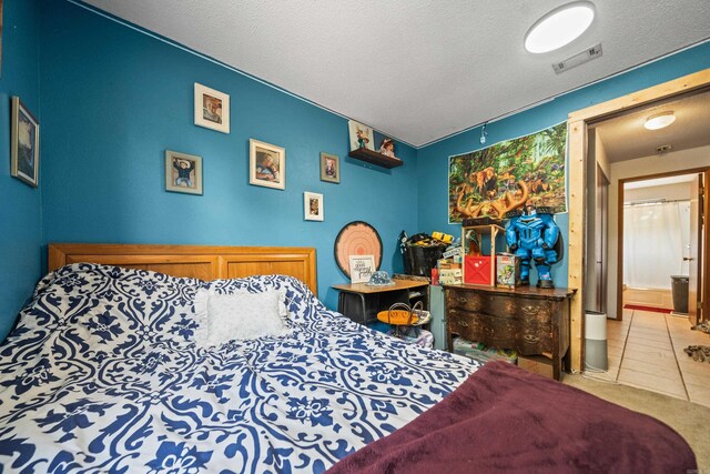 106 Gareth Ct, Hot Springs National Park, AR 71913 - bedroom featuring a textured ceiling and tile patterned floors