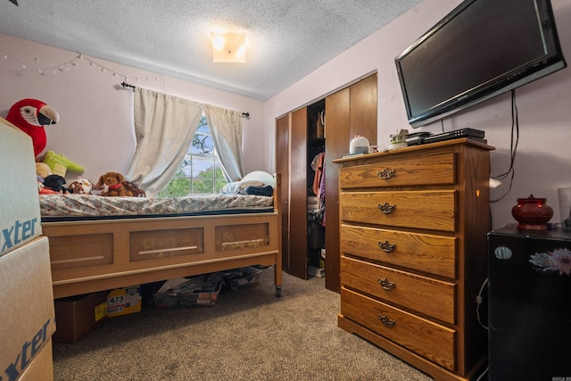 106 Gareth Ct, Hot Springs National Park, AR 71913 - carpeted bedroom with a textured ceiling and a closet