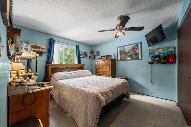 106 Gareth Ct, Hot Springs National Park, AR 71913 - carpeted bedroom with a textured ceiling and a ceiling fan