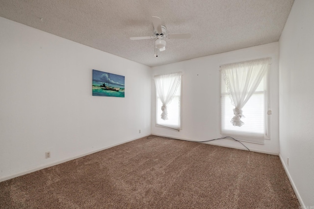 26 Destino Way, Hot Springs Village, AR 71909 - spare room with carpet flooring, a textured ceiling, a ceiling fan, and baseboards