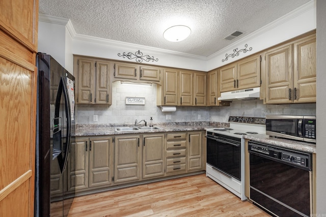 26 Destino Way, Hot Springs Village, AR 71909 - kitchen featuring black appliances, under cabinet range hood, a textured ceiling, decorative backsplash, and crown molding
