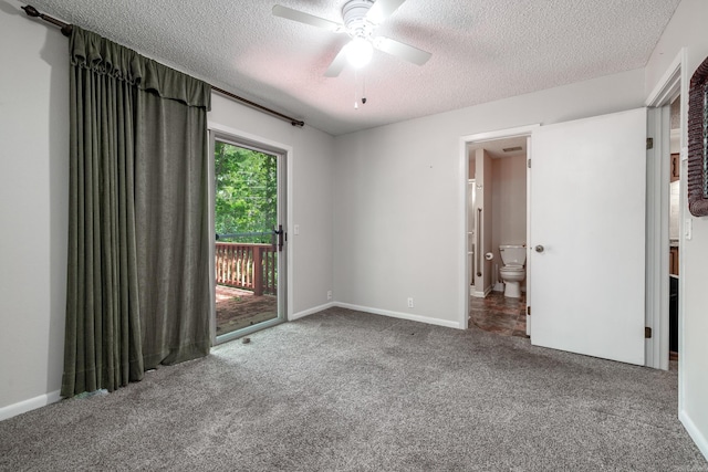 26 Destino Way, Hot Springs Village, AR 71909 - unfurnished bedroom with access to outside, a textured ceiling, carpet flooring, baseboards, and connected bathroom