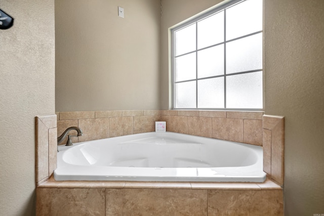 253 High Meadow Loop, Hot Springs, AR 71901 - full bath with healthy amount of natural light, a bath, and a textured wall