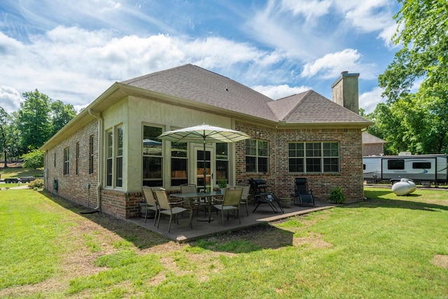 253 High Meadow Loop, Hot Springs, AR 71901 - rear view of house with a chimney, brick siding, and a lawn