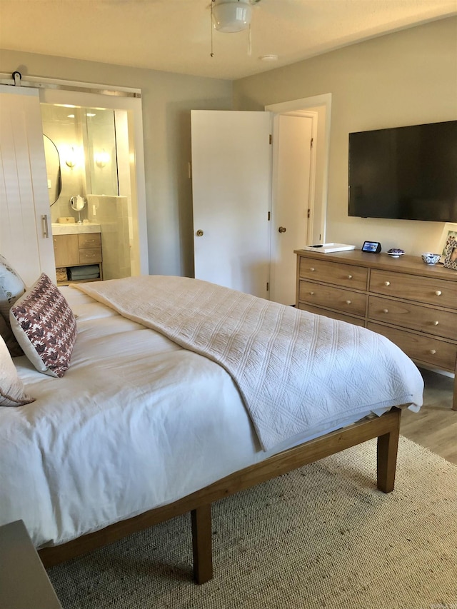 501 Belvedere Dr Unit C-1, Hot Springs, AR 71901 - bedroom with wood finished floors and ensuite bath