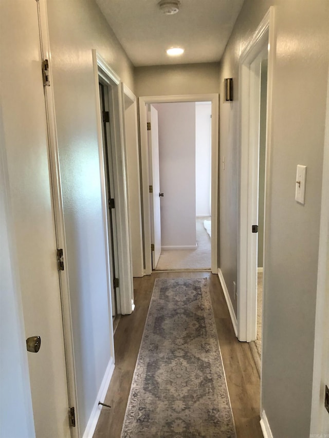501 Belvedere Dr Unit C-1, Hot Springs, AR 71901 - corridor with dark wood-style floors and baseboards