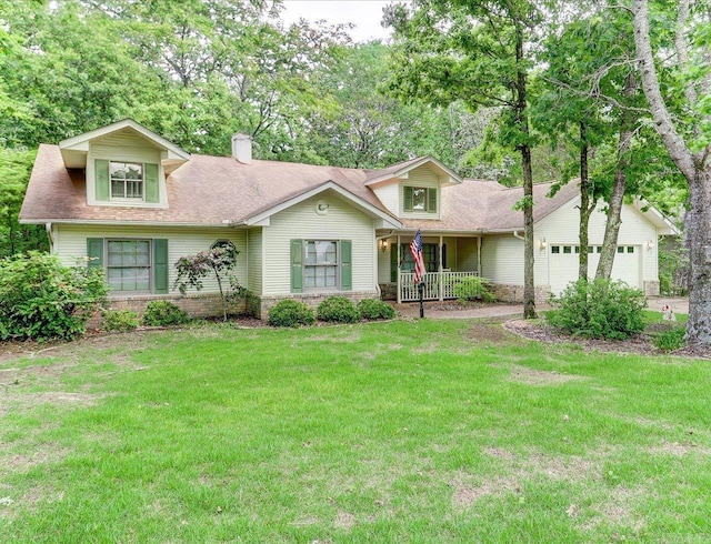 21 Conquista Ln, Hot Springs Village, AR 71909 - view of front of house featuring a front lawn, a garage, a chimney, and a porch