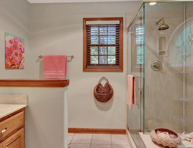 21 Conquista Ln, Hot Springs Village, AR 71909 - bathroom featuring tile patterned flooring, baseboards, vanity, and a shower stall