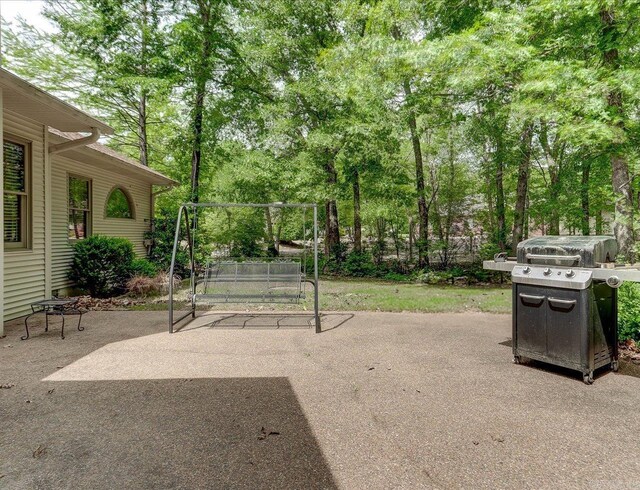 21 Conquista Ln, Hot Springs Village, AR 71909 - view of patio featuring view of scattered trees