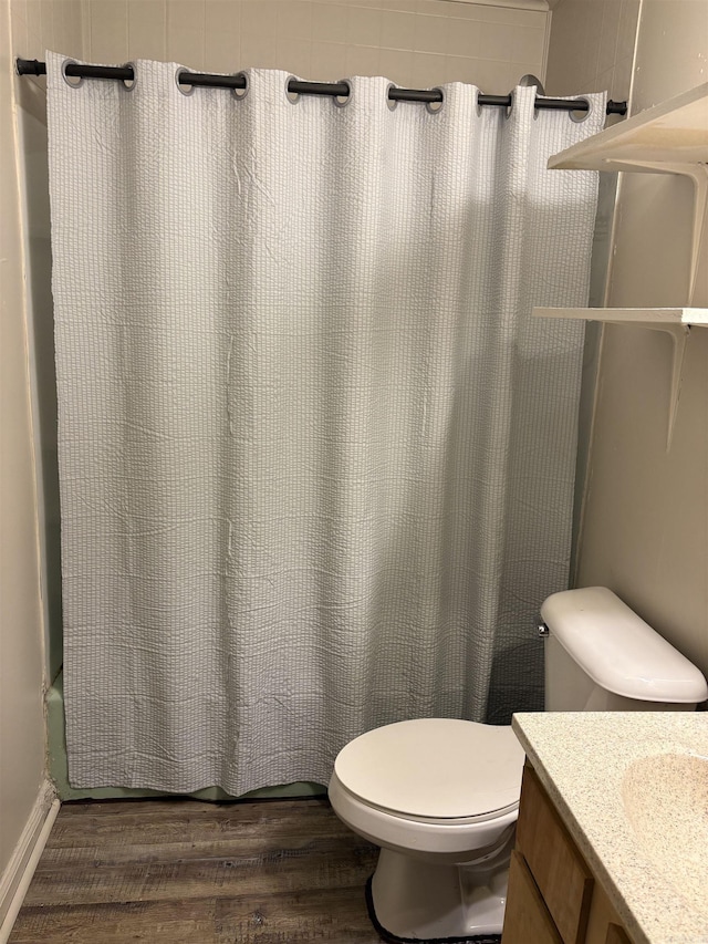 153 Pinehill Rd, Hot Springs, AR 71913 - full bathroom featuring wood finished floors, toilet, vanity, and shower / tub combo with curtain