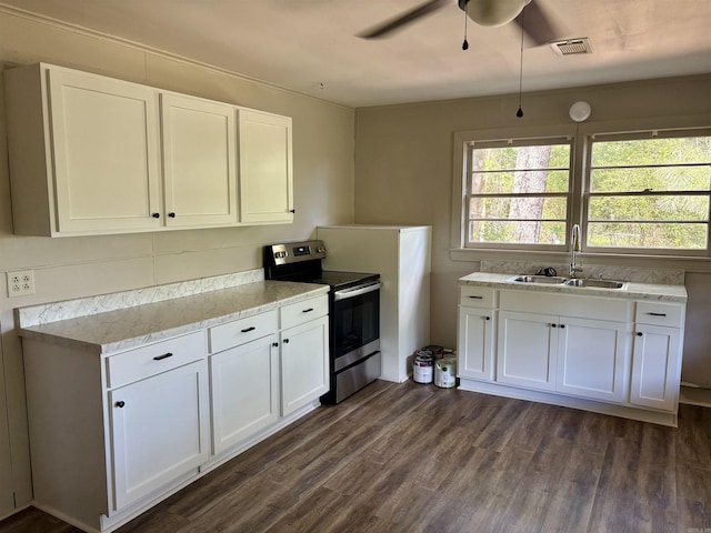 153 Pinehill Rd, Hot Springs, AR 71913 - kitchen featuring a sink, electric range, a ceiling fan, dark wood-style flooring, and white cabinets