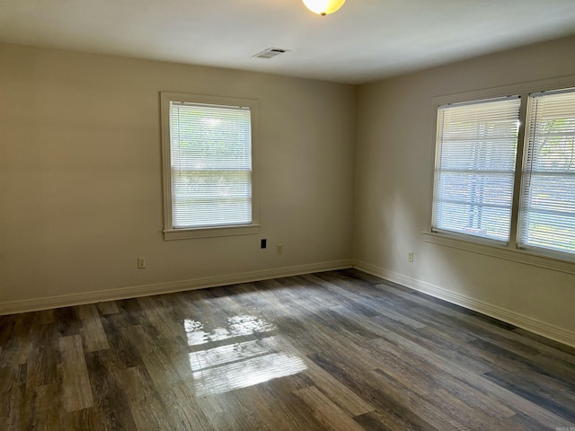 153 Pinehill Rd, Hot Springs, AR 71913 - spare room with healthy amount of natural light, dark wood-type flooring, and baseboards