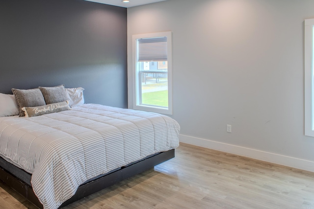 135 Serenity Loop, Glenwood, AR 71943 - bedroom featuring baseboards, wood finished floors, and recessed lighting