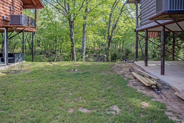 135 Serenity Loop, Glenwood, AR 71943 - view of grassy yard with a patio area